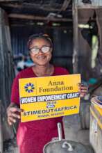 Mama is happy in her restaurant.