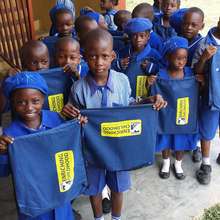 Kids with drawstring bags