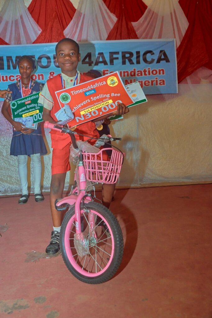 First prize winner receives a bicycle.