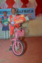 First prize winner receives a bicycle.