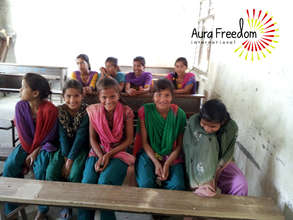 Shy girls in school giggle during our focus group.