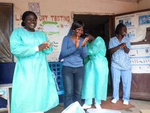 Nurses rejoice at the arrival of medical supplies