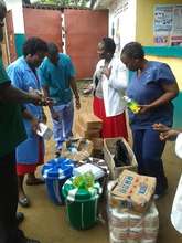 Sorting sanitation materials at Ferguson Clinic