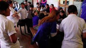 Bolivian Children learning about dental hygiene