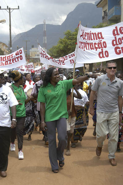 Maria with the Ambassador lead a parade in Gurue.