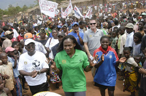 Maria with the Ambassador in a crowd in Gurue