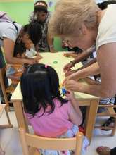 Playing dough with volunteers