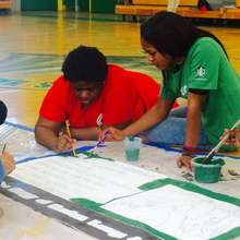 A corps member and Starbucks volunteer.