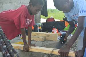 Learning by doing, helping with housebuilding