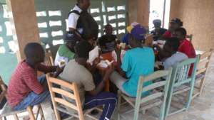 Staff and police meeting with youth-at-risk