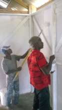 LFBS Youth helping paint new family home
