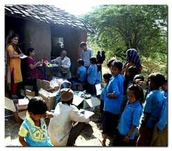 The children queue up for their turn at the camp