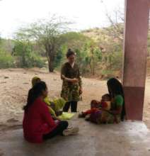Lydia interacting with tribal women