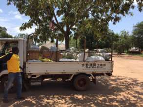 Truck delivering food to Okidi