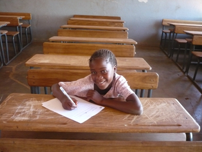 Velosa Joao Cossa filling out her 2009 MEpM application in Mapul