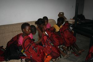 School supplies: red backpacks!