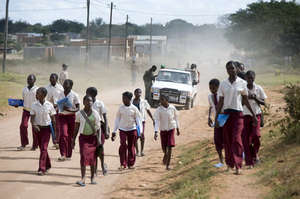 Off to school in dusty Magude