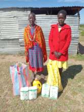 Felister and her mother receive food gift