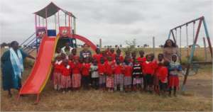 Preschool Children Enjoy their New Slides
