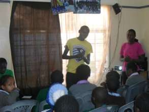 Karanja talking to youth about HIV/AIDS