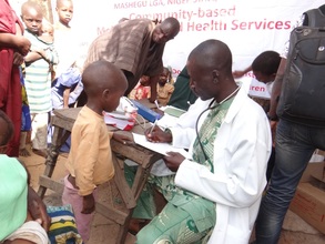 Abdullahi receiving malaria treatment