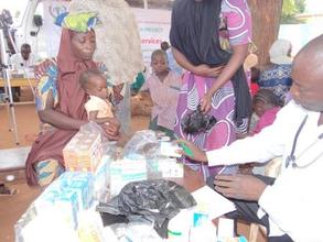 an infant receiving malaria treatment