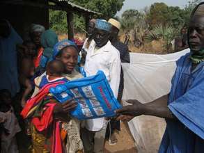 A nursing receiving ITN at Faje village