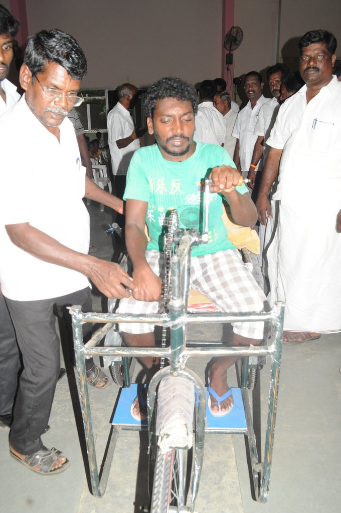 Tricycles,hearing aids to disable school children