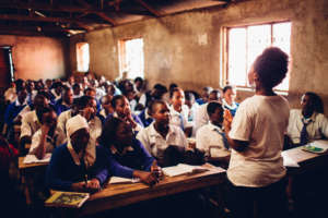 Lydia, FIH Fellow, teaching at a HS in Kibera