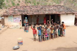 Kids at day care, while mothers step out to work.