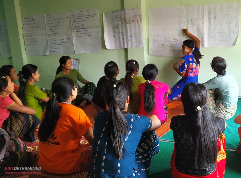 Young women practice the "Green Dot" map activity