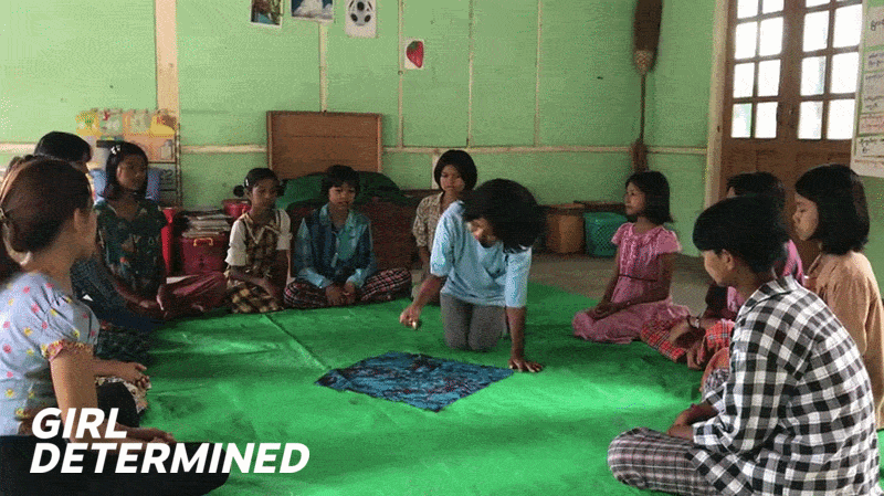 Thin Khine rings a bell to open the Circle.
