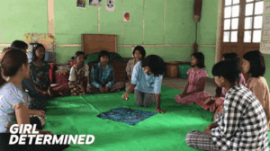 Thin Khine rings a bell to open the Circle.