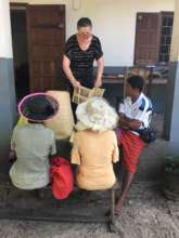 Docey compares quality of weaving to local weavers