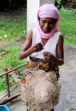 SEPALI Artisan making silk hats