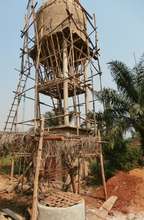 Well and aerial holding tank