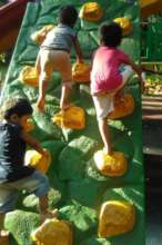 Umang beneficiaries experiencing rock climbing.