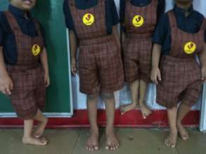 Umang children in their new school uniforms