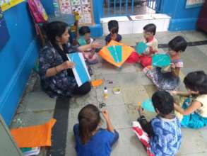 Kite making activity with Umang beneficiaries.