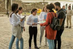 Speaking with tourist in the Historic City Center