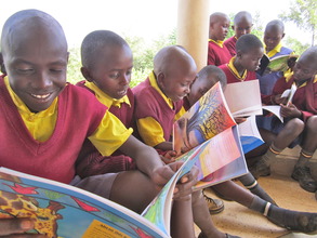 Students from Mbaikini PS reading books at LRC
