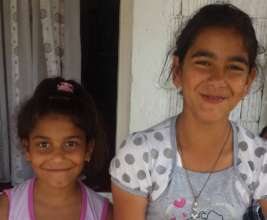 Vjollca and Shpresa at their house