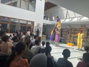 Children and parents enjoying the show