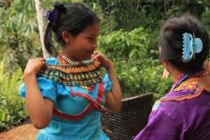 Monica, Indigenous council member.