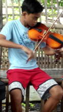 Jomari, a promising violinist