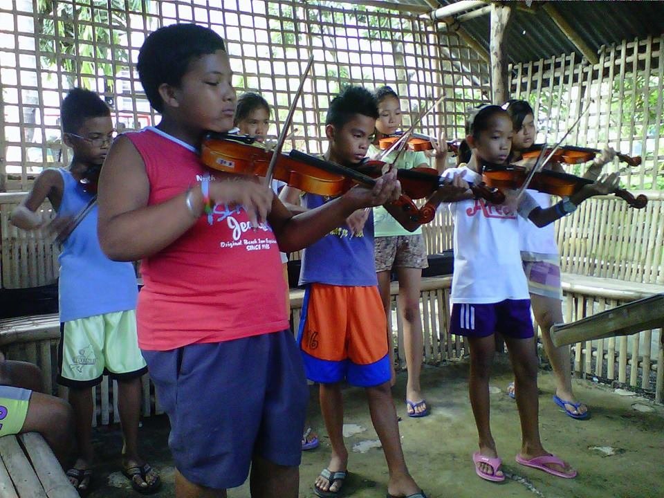 Teach Classical Music to poor kids of Talim Island