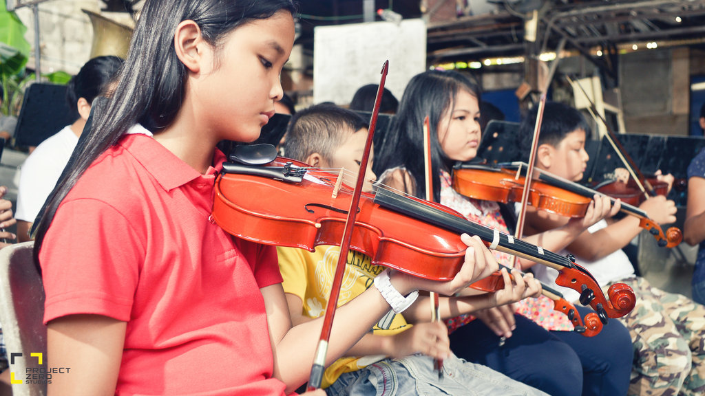 Teach Classical Music to poor kids of Talim Island
