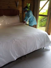 Johany working in one of the hotel rooms
