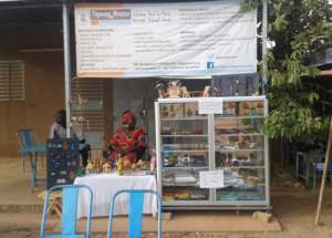 Zoenabou promoting crafts during the festival