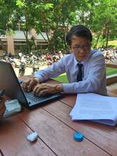 Studying hard on the campus grounds